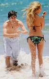 th_49799_ashley-tisdale-beach-738-2_122_1056lo.jpg