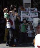 Carrie Anne Moss with hubby and kids