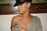 th_22236_celebrity-paradise.com-The_Elder-Rihanna_2010-01-10_-_gets_a_new_Tattoo_535_122_98lo.jpg